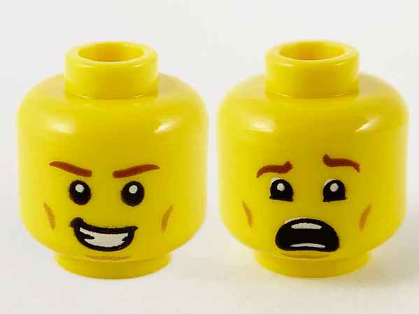 Minifigure, Head Dual Sided Reddish Brown Eyebrows, Medium Nougat Cheek and Chin Lines, Smile with Teeth / Scared Pattern