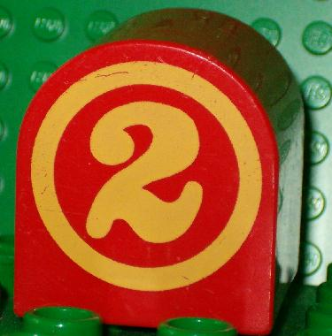 Duplo, Brick 2 x 2 x 2 Slope Curved Double with Circled Number 2 Pattern