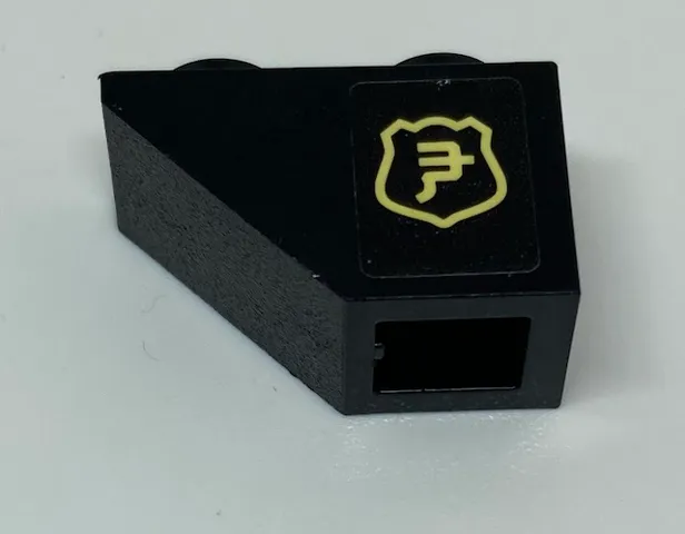 Slope, Inverted 45 2 x 1 with Yellow Ninjago Logogram in Shield Pattern Model Left Side (Sticker) - Set 70607