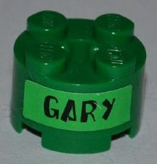Brick, Round 2 x 2 with Axle Hole with Black 'GARY' on Bright Green Background Pattern on Both Sides (Stickers) - Set 3834