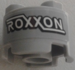 Brick, Round 2 x 2 with Axle Hole with 'ROXXON' Pattern (Sticker) - Set 76067