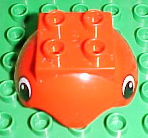 Duplo Ball Tube Cover with Hinge, 2 x 2 Studs, and Wavy Edge with Eyes Pattern