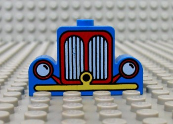 Brick, Modified 1 x 4 x 2 Center Stud Top with Car Grille Fabuland yellow/red Pattern