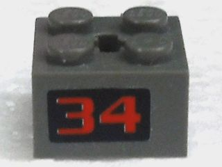 Hinge Brick 2 x 2 Locking with 2 Fingers Vertical and Axle Hole with Red '34' on Black Background Pattern (Sticker) - Set 4589