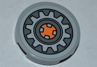 Tile, Round 2 x 2 with Gear Wheel with Orange Center on Dark Bluish Gray Background Pattern (Sticker) - Set 9444