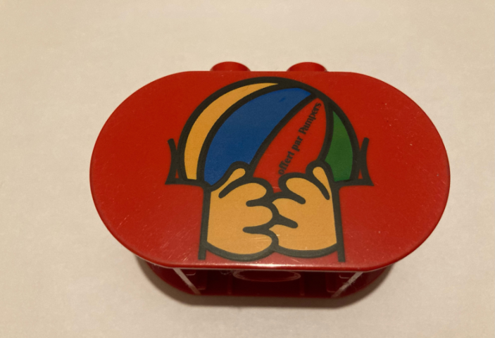 Duplo, Brick 2 x 4 x 2 Rounded Ends with Hands Holding Ball with 'offert par Pampers' Pattern