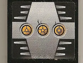 Panel 1 x 4 x 3 - Hollow Studs with 3 Yellow Circles with Bionicle Code B on Silver Background Pattern (Sticker) - Set 8758