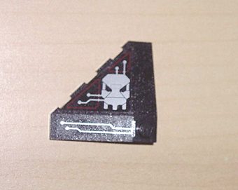 Wedge 4 x 4 (Slope 18 Corner) with Silver and Dark Red Circuitry and Skull Pattern (Stickers) - Set 7702
