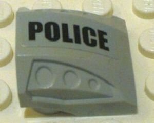Slope, Curved 2 x 2 with Debossed Side Ports with Black 'POLICE' Pattern Model Left Side (Sticker) - Set 7899