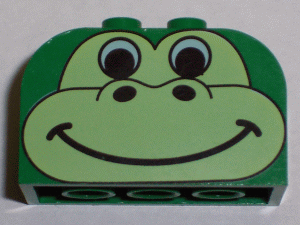 Slope, Curved 4 x 2 x 2 Double with 4 Studs with Animal (Dinosaur / Gorilla) Face Pattern