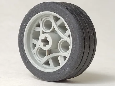 Wheel 36.8 x 14 ZR with Axle Hole and 3 Pin Holes with Molded Black Hard Rubber Tire Pattern