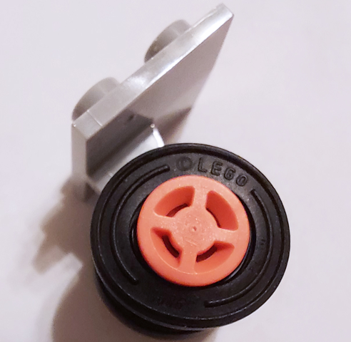 Plate, Modified 2 x 2 Thin with Dual Wheels Holder - Split Pins with Coral Wheels with Slot and Black Tires (4870 / 34337 / 59895)