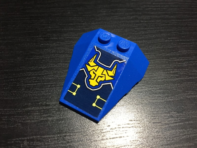 Wedge 4 x 4 Triple with Stud Notches with Yellow Nexo Knights Bull Head and Circuitry Pattern (Sticker) - Set 70322