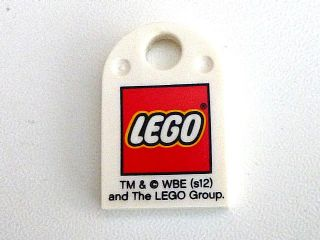 Tile, Modified 3 x 2 with Hole with LEGO Logo Small and 'TM & © WBE (s12) and The LEGO Group.' Pattern