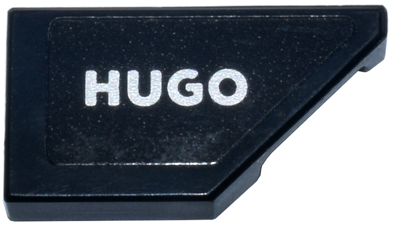 Tile, Modified 1 x 2 Wedge Right with Silver 'HUGO' Logo Pattern (Sticker) - Set 77246