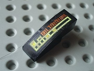 Slope, Curved 3 x 1 with Light Bars and Alien Characters Pattern Model Left Side (Sticker) - Set 7647