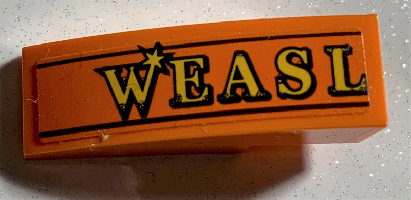 Slope, Curved 3 x 1 with Yellow 'WEASL' and Black Lines Pattern (Sticker) - Set 75978