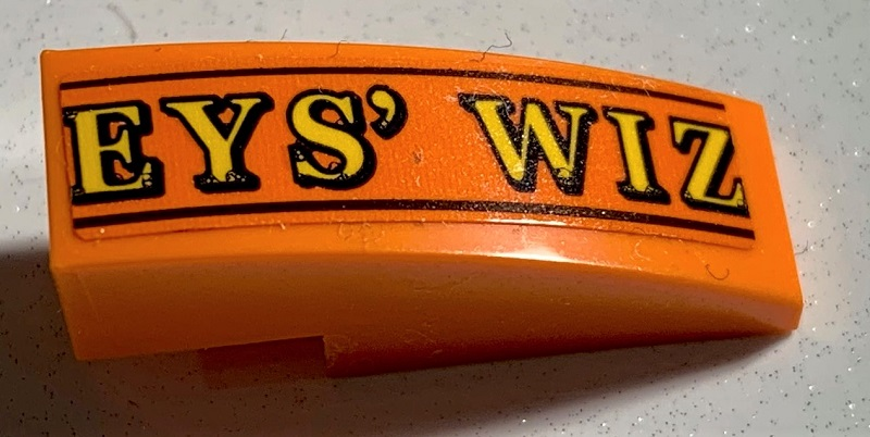 Slope, Curved 3 x 1 with Yellow 'EYS' WIZ' and Black Lines Pattern (Sticker) - Set 75978