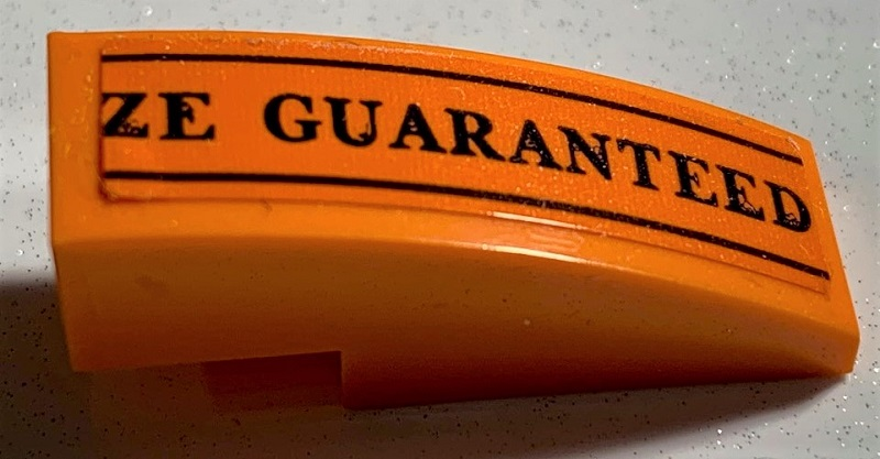 Slope, Curved 3 x 1 with Black 'ZE GUARANTEED' and Lines Pattern (Sticker) - Set 75978