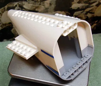 Aircraft Fuselage Aft Section Curved with Fixed Light Bluish Gray Base and White Hard Rubber Tip with Dark Bluish Gray and Blue Stripes Pattern on Both Sides