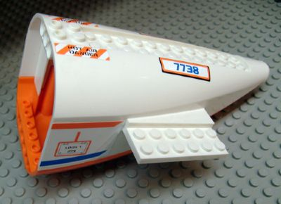 Aircraft Fuselage Aft Section Curved with Fixed Orange Base and White Hard Rubber Tip with Orange and Blue Stripes, 'HOT AIR DANGER', and '7738', Access Panel Pattern on Both Sides (Stickers) - Set 7738