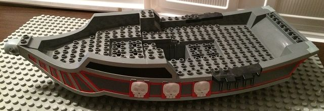 Duplo Boat Hull 14 x 31 Top Section with Red Trim and White Skulls