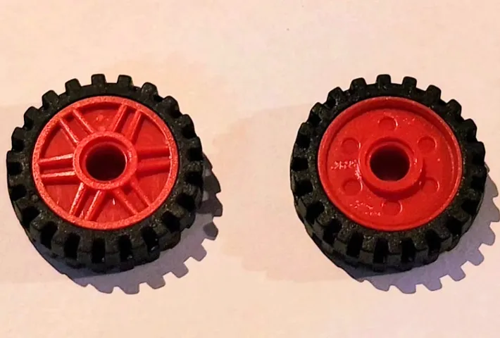 Wheel 18mm D. x 8mm with Fake Bolts and Shallow Spokes with Black Tire 24mm D. x 7mm Offset Tread - Band Around Center of Tread (56902 / 61254)
