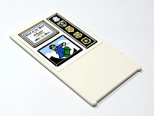 Glass for Window 1 x 4 x 6 with 'Chief of the Year Wheeler' Certificate in Frame, Gold Police Badges and Minifigure on Green Skateboard Pattern (Sticker) - Set 60246