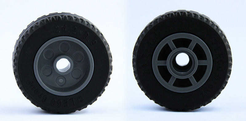 Wheel 14mm D. x 11mm with Center Groove, Fake Bolts, 6 Spokes and Flange with Black Tire 24.2 x 9.9 (5807 / 5033)