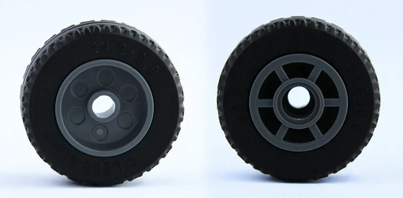 Wheel 14mm D. x 11mm with Center Groove, Fake Bolts, 6 Spokes and Flange with Black Tire 24.2 x 9.9 (5807 / 5033)