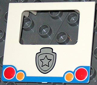 Duplo Van Rounded Windshield Rear Door with Red and Orange Taillights, Blue Bumper, and Silver Police Badge Pattern