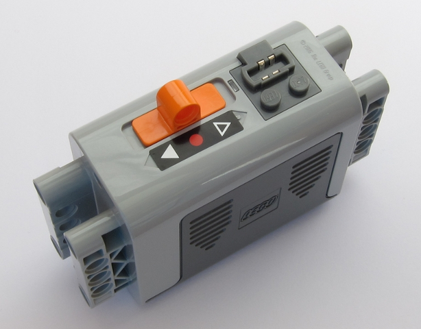 Electric 9V Battery Box 4 x 11 x 7 PF with Red Dot and White Arrows on Black Background Pattern (Sticker) - Set 42043