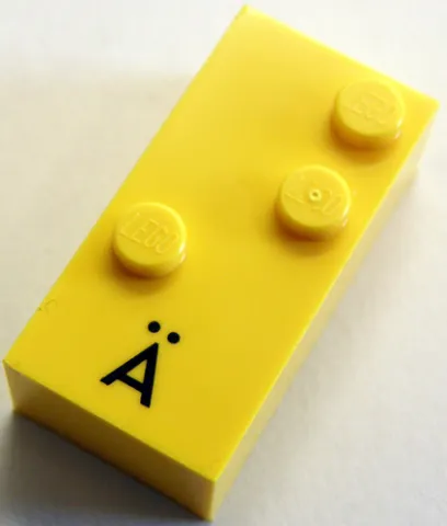 Brick, Braille 2 x 4 with 3 Studs with Black Capital Letter A with Diaeresis (Ä) Pattern (dots-345 ⠜) (German)