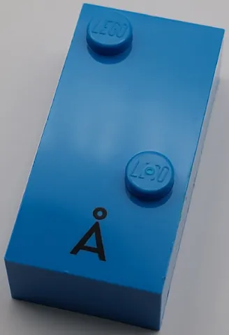 Brick, Braille 2 x 4 with 2 Studs with Black Capitol Letter A with Ring (Å) Pattern (dots-16 ⠡)