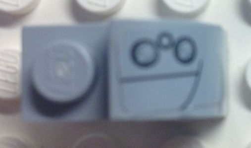 Slope, Curved 2 x 1 x 1 1/3 with Recessed Stud with 3 Running Lights Pattern Model Left Side (Sticker) – Set 8654