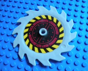 Technic Circular Saw Blade 9 x 9 with Pin Hole and Teeth in Same Direction with Black and Yellow Stripes and Dark Red Pattern (Sticker) - Set 8113