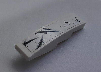 Slope, Curved 4 x 1 with Black and Light Bluish Gray Scratches Pattern 4 (Sticker) - Set 70009