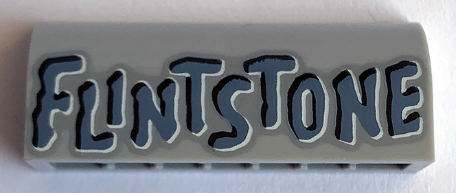 Slope, Curved 1 x 4 x 1 1/3 with 'FLINTSTONE' Pattern