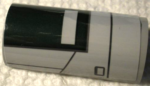 Slope, Curved 2 x 4 Double with Groove with Dark Green Rectangle and Dark Bluish Gray Lines and Hatches Pattern (Sticker) - Set 75312