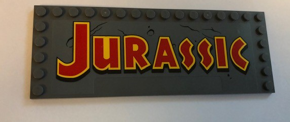 Tile, Modified 6 x 16 with Studs on Edges with 'JURASSIC' Pattern (Sticker) - Set 75936