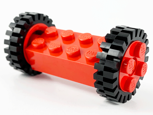 Brick, Modified 2 x 4 with Pins with 2 Red Wheel FreeStyle with Technic Pin Hole and 2 Black Tire 24mm D. x 8mm Offset Tread (6249 / 6248 / 3483)