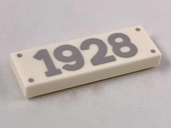 Tile 1 x 3 with 4 Silver Nails and '1928' Pattern