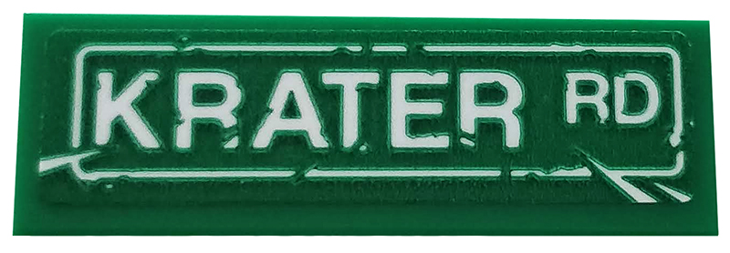 Tile 1 x 3 with Road Sign with White 'KRATER RD' and Scratches Pattern (Sticker) - Set 76128