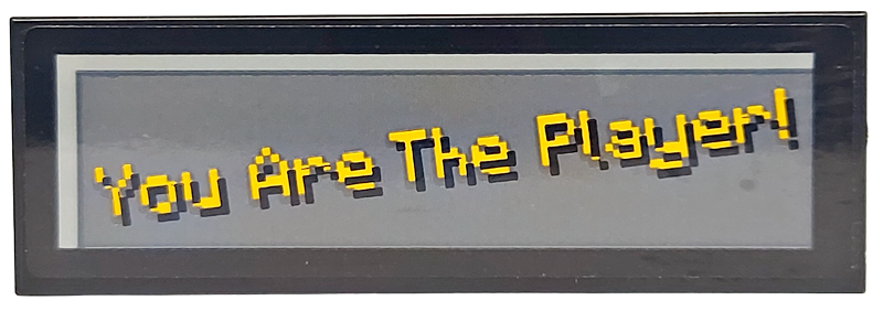 Tile 2 x 6 with Pixelated Bright Light Orange 'You Are The Player!' on Dark Bluish Gray Background Pattern (Sticker) - Set 21265