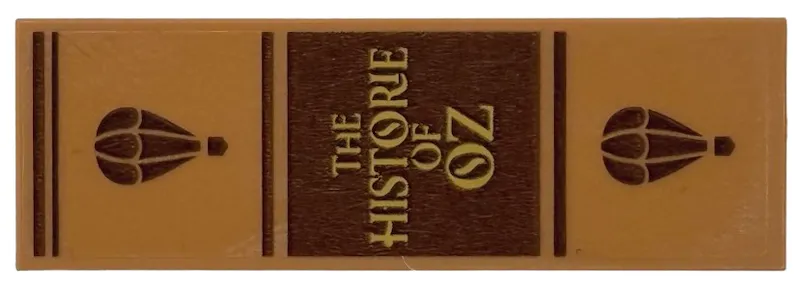 Tile 2 x 6 with Reddish Brown Lines, Hot Air Balloons and Gold 'THE HISTORIE OF OZ' Pattern (Sticker) - Set 75691