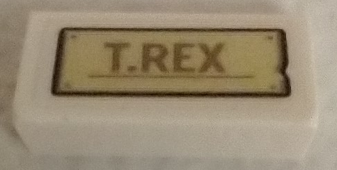 Slope 30 1 x 2 x 2/3 with 'T-REX' on Tan Sign Pattern (Sticker) - Set 76961