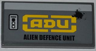 Tile 2 x 4 with Buttons and 'ADU ALIEN DEFENCE UNIT'  Pattern Model Left Side (Sticker) - Set 7066