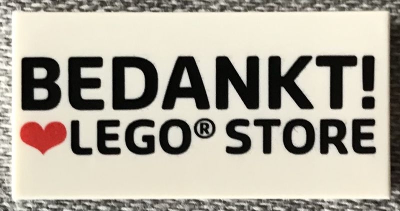 Tile 2 x 4 with 'BEDANKT! Heart LEGO STORE' Pattern