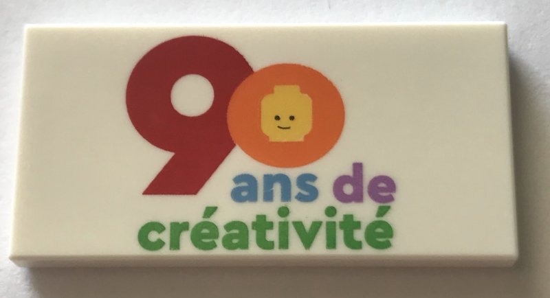Tile 2 x 4 with '90 ans de créativité' Pattern