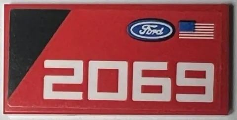 Tile 2 x 4 with Ford Logo, United States of America (USA) Flag, Black Triangle, and White '2069' Pattern Model Left Side (Sticker) - Set 76905
